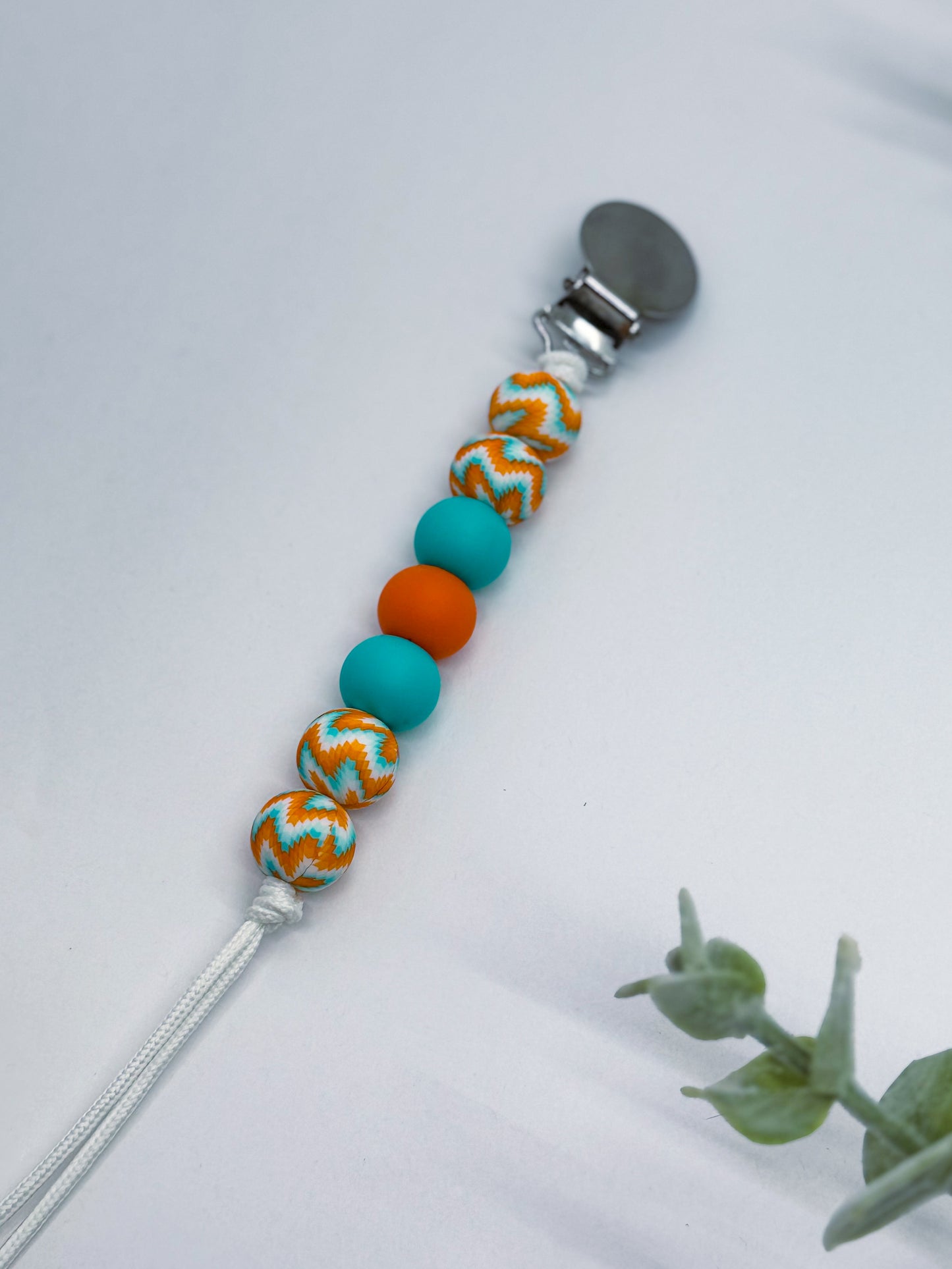 Turquoise Tango Pacifier Clip