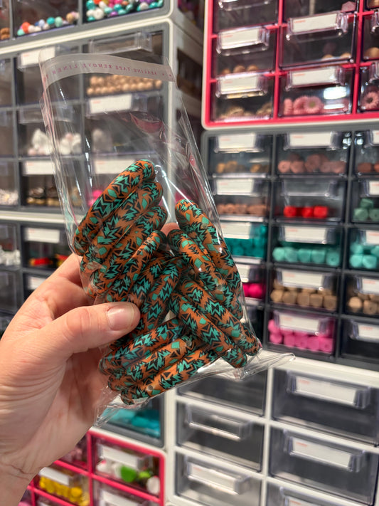 Rust/teal Aztec 65mm rings