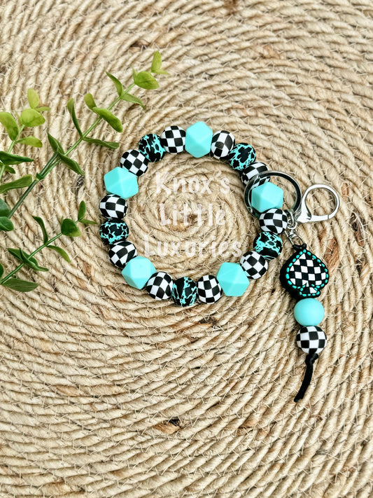 Aqua Cow Checkered Wristlet