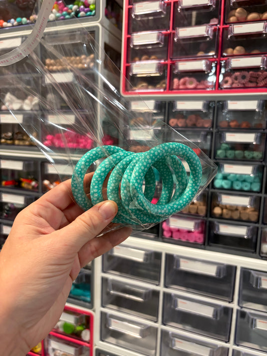 Teal flower print 65mm rings