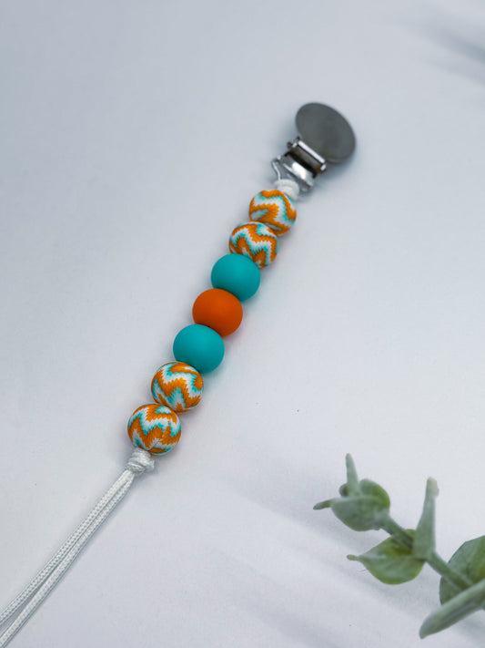 Turquoise Tango Pacifier Clip